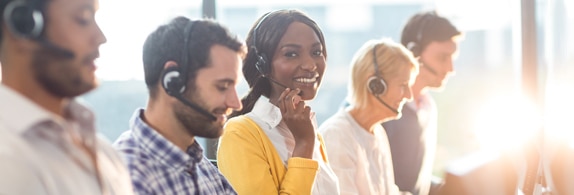 Picture of support team talking with customers